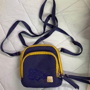 Haiku purse with long strap.